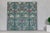 A vintage hand-painted room divider featuring vibrant flowers and delicate vines. This vintage hand-painted room divider...