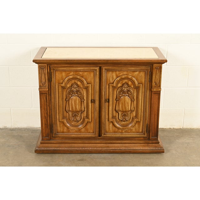 A beautiful Neoclassical or French Regency Louis XVI style sideboard, buffet server, or bar cabinet By Stanley Furniture...