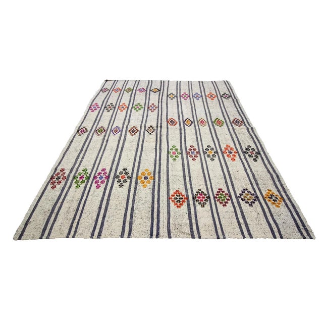 Embroidered vintage kilim rug from Adana region of Turkey. Approximately 50-60 years old. In very good condition