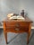 A refined Federal Style mahogany side table by Lane, distinguished by its beautifully executed marquetry top. The...