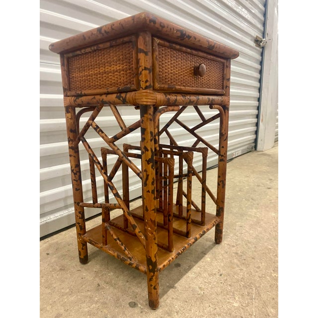 British Colonial Style Boho Chic Side Table featuring Faux Bamboo frames with a Faux Tortoise Finish, handwoven Cane...