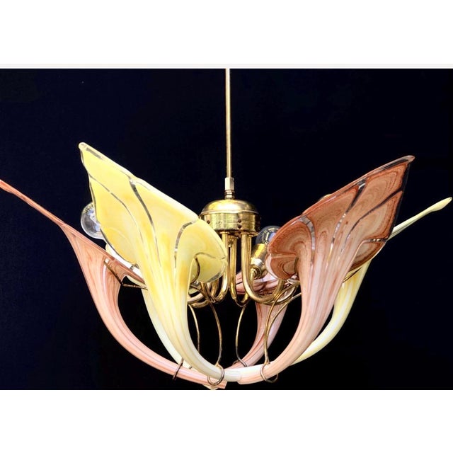 Mid-Century Italian Murano Style Amber & Brown Glass Leaf Chandelier An exquisite Italian Mid-Century Modern chandelier...
