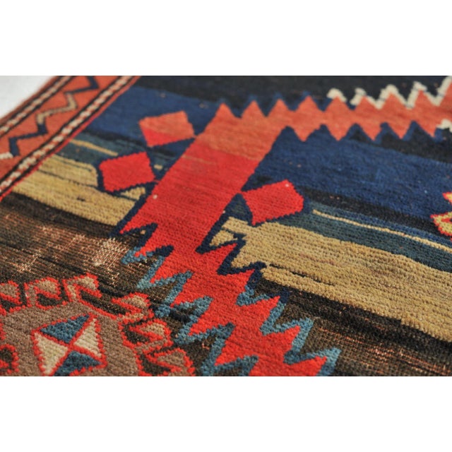 Name: Aztec Size: 4.1 x 8.3 Age: Antique Pile: Low About: STUNNING Geometric with strength and character! This is a very...