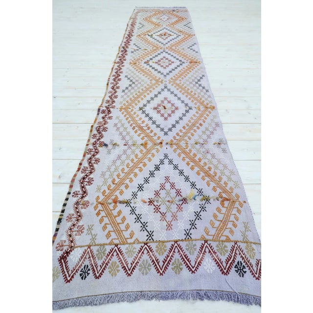 Beautiful vintage Turkish kilim runner rug made pure handspun wool and dyed naturally. Beautiful colours. this vintage...