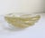 A substantial 9" diameter, 7.5 lb. Murano bullicante art glass centerpiece bowl or ashtray. The piece features thick, pale...