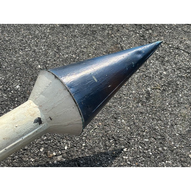 A Space Age Barber Pole! Amazing and entirely original metal four section retail sign. Mid 20th C., fashioned to be the...