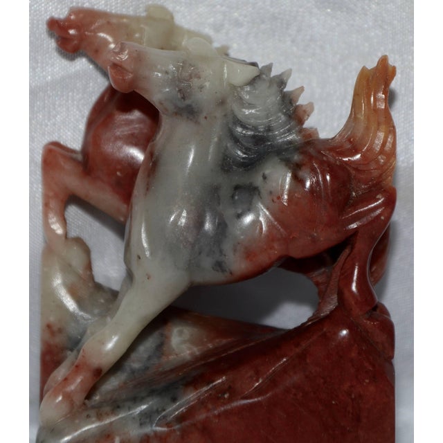 This is a quality soapstone stamp carved in the form of two rearing horses mounted atop an integrated plinth. The base is...