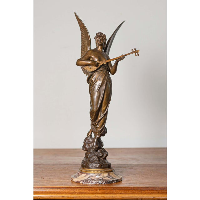 This exquisite 19th-century French bronze statuette is a masterful representation of Neoclassical artistry, showcasing the...