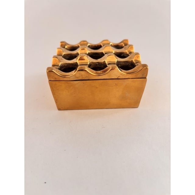 Vintage Ultima Ashtray in Brass by Holger Bäckström and Bo Ljungberg, 1970s, in Very Good conditions. Designed 1970 to...