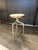 Shown with a white marble top and natural brass base. This side table has a clean simple design aesthetic of the early...