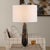 The Dames Table Lamp Showcases A Striking Dark Marble Base With Contrasting White And Chocolate Brown Veining,...