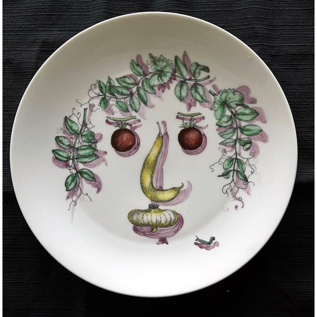 Fornasetti Porcelain plate with face made with arranged vegetables. Stamped "1, Fornasetti-Milano, Made in Italy,...