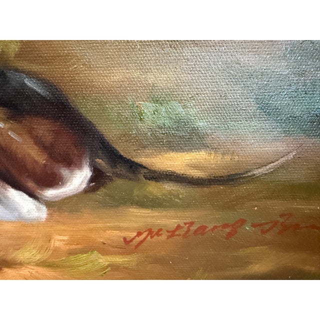 This classic equestrian hunting oil painting depicts a mounted huntsman in traditional red hunting attire, accompanied by...