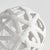 This contemporary little orb is made of thin ceramic strips giving it an open feel. It is perfect in a wide open bowl or...