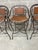 Iron Horseshoe Back and Leather Chairs in an antique brown finish. Seats and arm rests arm are in leather woven webbed...
