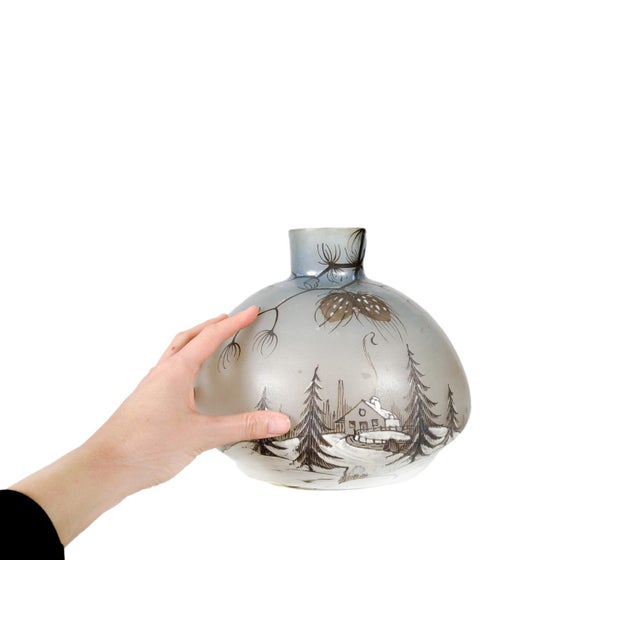 An early 20th-century Art Nouveau enameled cameo glass vase by Leune, inspired by the renowned works of the Daum brothers...