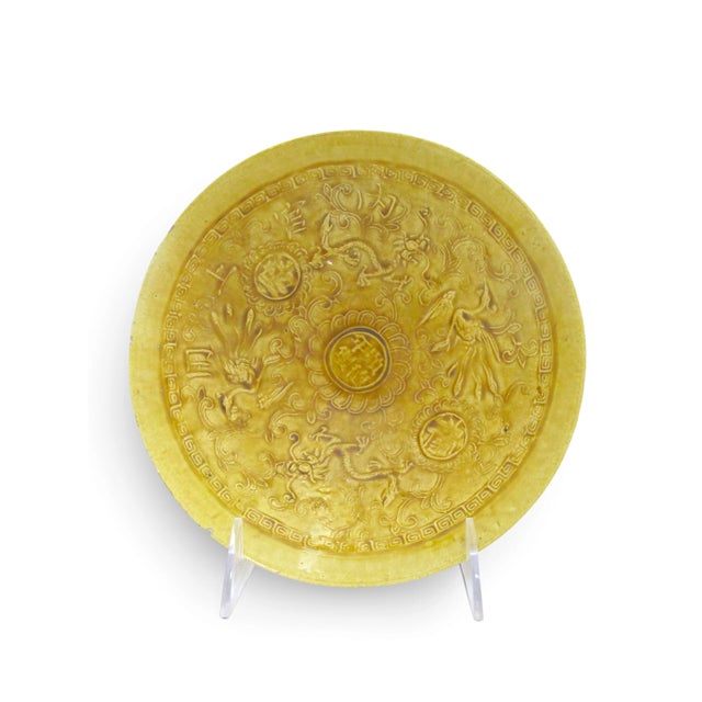 Chinese Ming Hongzhi style imperial yellow glazed delicate porcelain bowl with dense incised dragon and phoenix patterns....