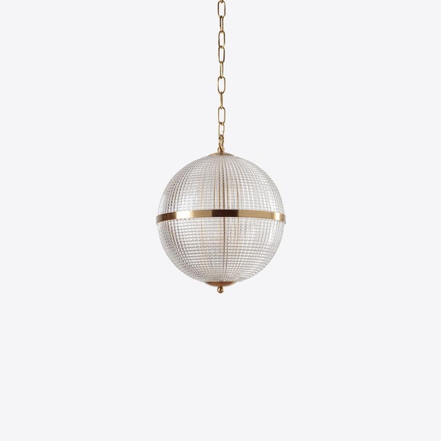 Our Clear Parisian Globe Light is made from beautiful prismatic moulded glass with brass hardware and fittings for the...