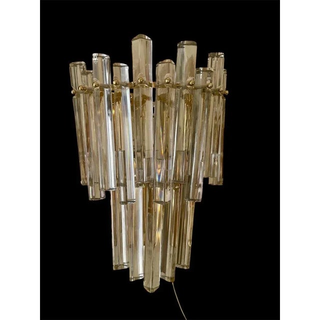 Venini wall lamp in Murano glass with iridium glass. The design and the quality of the glass make this piece the best in...