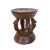 Vintage carved wood round stool from Mali. Beautiful aged chestnut finish. Carved star on top and triangular design...
