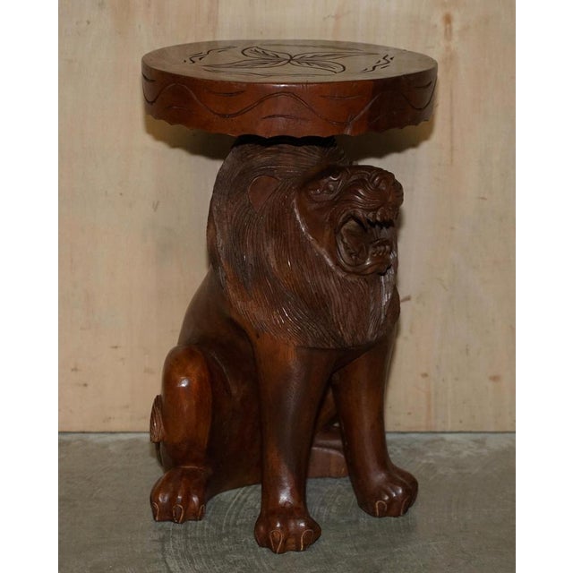 We are delighted to offer for sale this stunning pair of hand carved African Lion stools with ornate detailing all over. A...