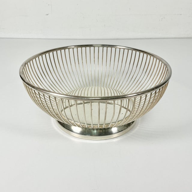 From Gorham Silver Company, this wire Silverplate Bread Basket Serving Dish is so well designed. It features wire rods...