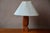 with its superb hand-carved solid teak base, this stunning Danish lamp embodies the history of 1960s Scandinavian...