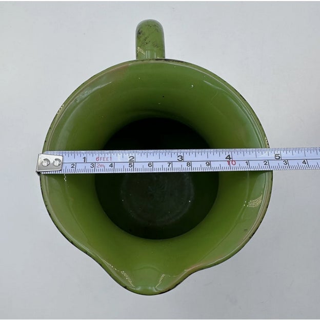 This vibrant Italian Green Ombré Ceramic Pitcher will look lovely on your breakfast table, ready to serve up milk, water...