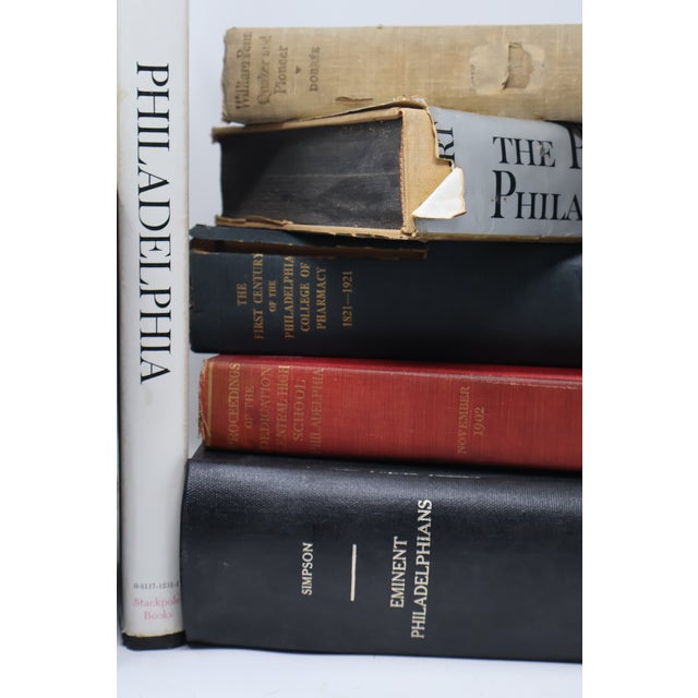 An assembled collection of eleven antique and vintage hardcover books exploring Philadelphia’s people, institutions,...