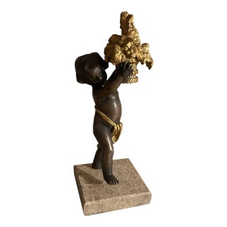 19th Century Italian Small Sculpture of a Cherub Holding a Basket of Flowers For Sale