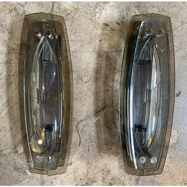 Beautiful Pair of 2 VECA Italian double glass wall sconces made with glass and chrome details. An elegant and simple item...