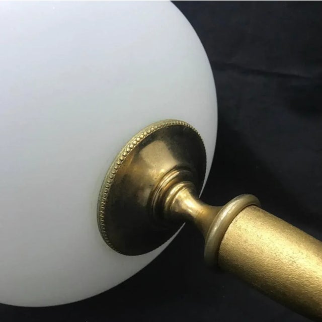 Amazing table lamp designed by Guglielmo Ulrich for F. I. L. C. Milano, golden metal and milk glass, original conditions....