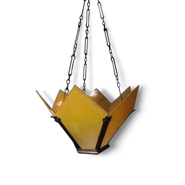 Vintage Art Deco Brass Crown-Shaped Pendant Light with Yellow Frosted Glass Panes, in Good conditions. Designed 1920 to...