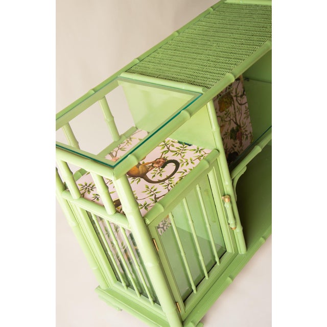 How fun is this entertainment center/ bar? We couldn't resist the wallpaper! This beautiful bamboo and rattan piece was...