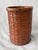 Small vintage woven bamboo wastebasket. Very good condition. Basket measures 7" in diameter by 10 1/2" in height. Thank...