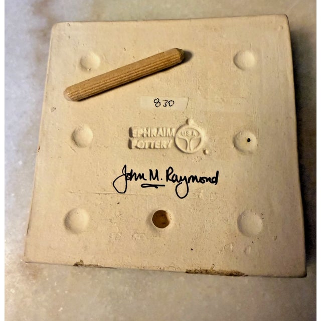 A rare and collectible "Logo Block" dealer sign tile by the Ephraim Faience Pottery studio (Lake Mills, WI). This heavy,...