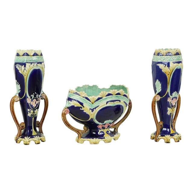 Rare set of 3 Art Nouveau objects consisting of 2 identical vases and a matching jardinière, made of barbotine or majolica...