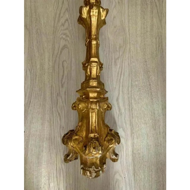 Date/Period: 18th century Dimension: 84cm Materials: golden painted wood Additional Information: Italian candleholder from...