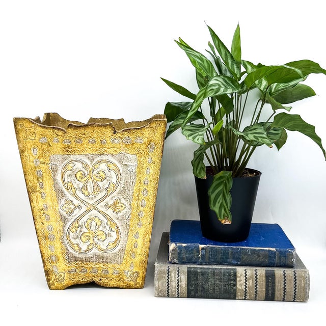Beautiful, Florentine giltwood wastebasket with embossed scrollwork and a central decorative motif with subtle fleur-de-...