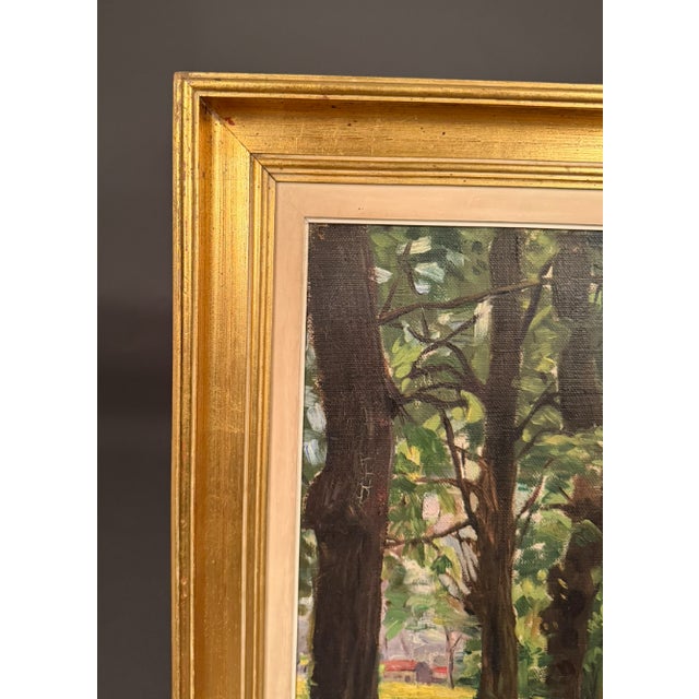 A beautifully rendered antique Impressionist landscape oil painting depicting a serene country path winding through a...