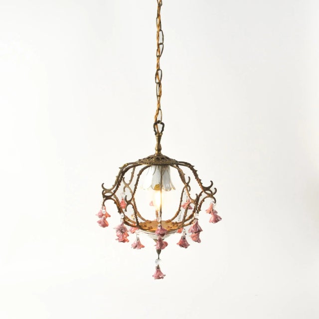 Incredibly charming French or Spanish chandelier featuring hanging pink ceramic roses with little crystals, white...
