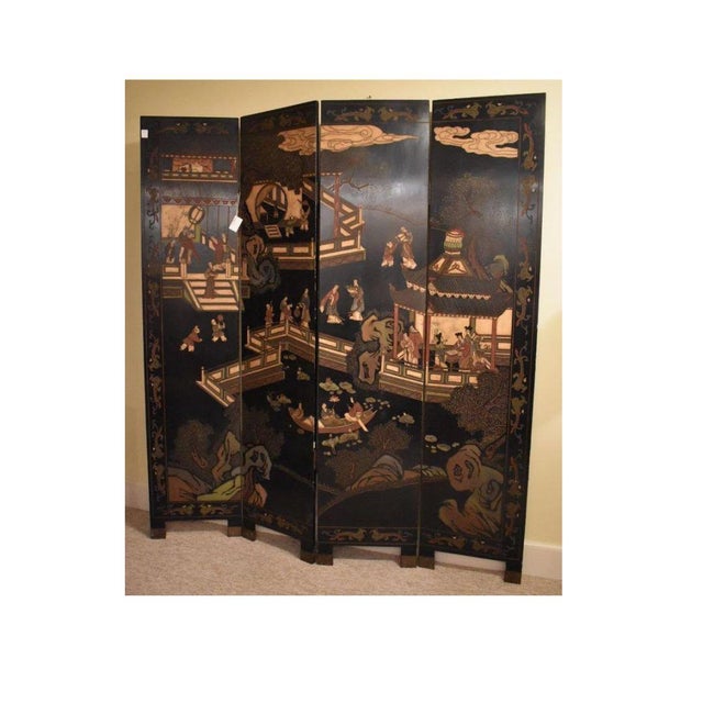 Chinese black lacquer coromandel folding screen in four sections. A vintage 20th century piece, In quite good order with...