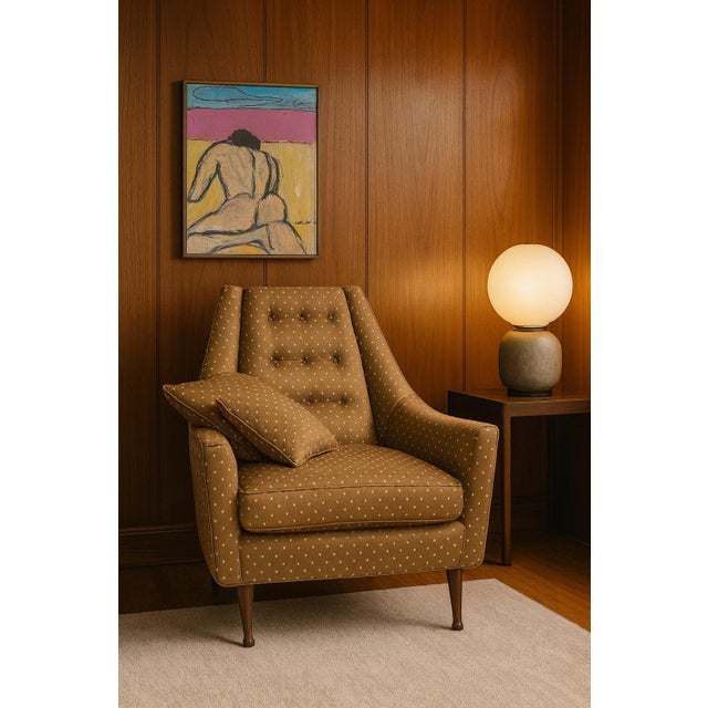 Inspired by the iconic designs of Adrian Pearsall, this midcentury modern tufted upholstered armchair embodies sculptural...