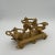 A lovely cast gold metal English Aesthetic Movement Centerpiece. The three round holders would be great with pillar...