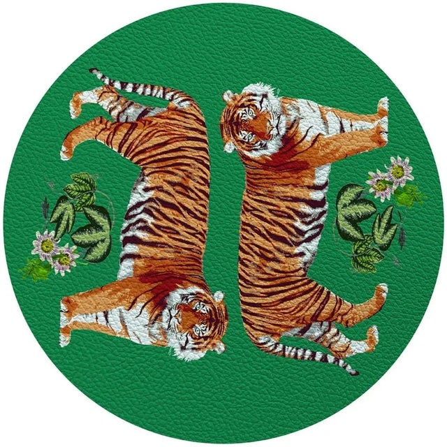 These pebbled vinyl leather placemats have patterns on the front and off-white on the back. This set can be used indoors...