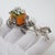 This vintage silver decorative object depicts cinderella's pumpkin carriage miniature, crafted as a fairy tale vitrine...