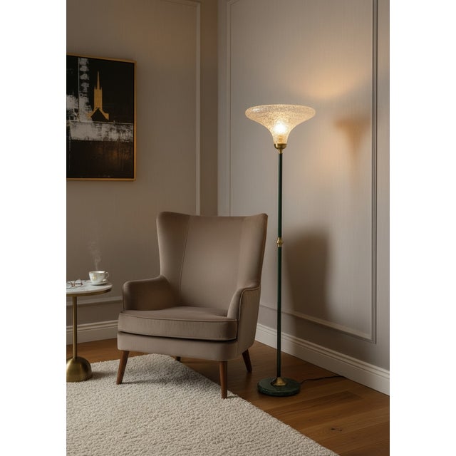 Striking and elegant, this Italian floor lamp from the 1950s combines sculptural simplicity with refined materials,...