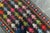 This antique Moroccan kilim is vibrantly bold and whimsical in contrasting colors such as pink, plum, tangerine-red,...