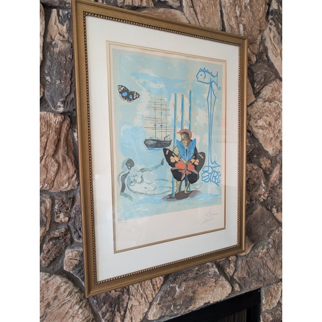 A captivating limited edition lithograph by Salvador Dalí titled "Three of Staves", showcasing the master surrealist’s...