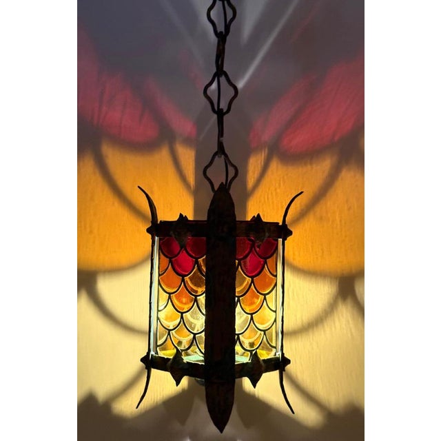 Italian hanging lantern from the 1960s – exquisite hand-forged craftsmanship this exceptional hanging lantern is a...